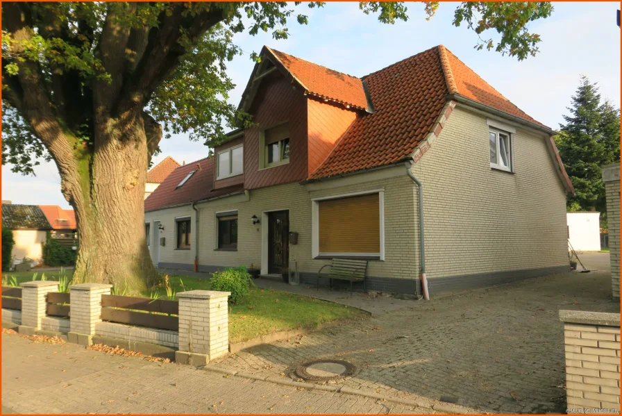 Straßenansicht - Haus kaufen in Beverstedt - Kapitalanleger aufgepasst! Interessantes Mehrfamilienhaus in Beverstedt