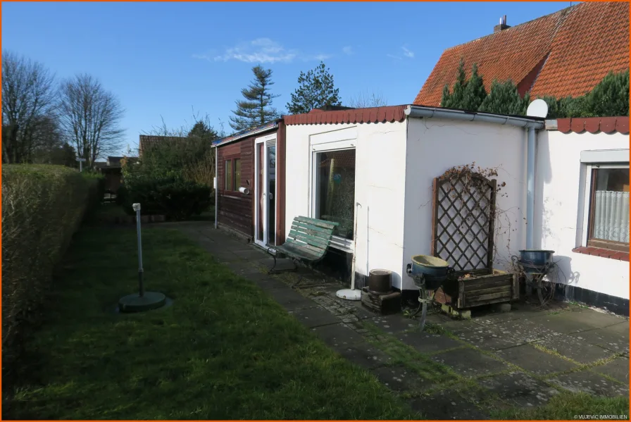 Straßenansicht - Haus kaufen in Bremerhaven - Gemütliches kleines Eigenheim am Schiffdorferdamm