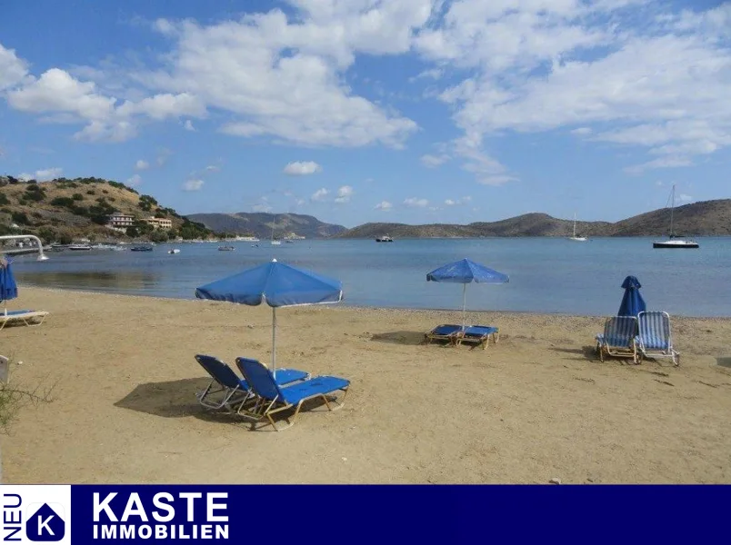 Titel - Grundstück kaufen in Elounda - Baugrundstück am Strand auf Kreta, kurzfristige Bebauung möglich.