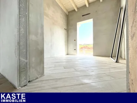 Titel - Haus kaufen in Isola Rossa - Neubau-Einheit mit Meerblick, fußläufig zum Sandstrand im Norden Sardiniens