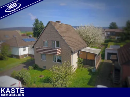 Titel - Haus kaufen in Lauenau - Familienhaus im Grünen mit Blick auf den Deister nahe Hannover