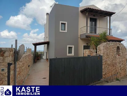 Titel - Haus kaufen in Akrotiri - Modernes Einfamilienhaus mit Blick auf das Meer und die Berge auf Kreta.