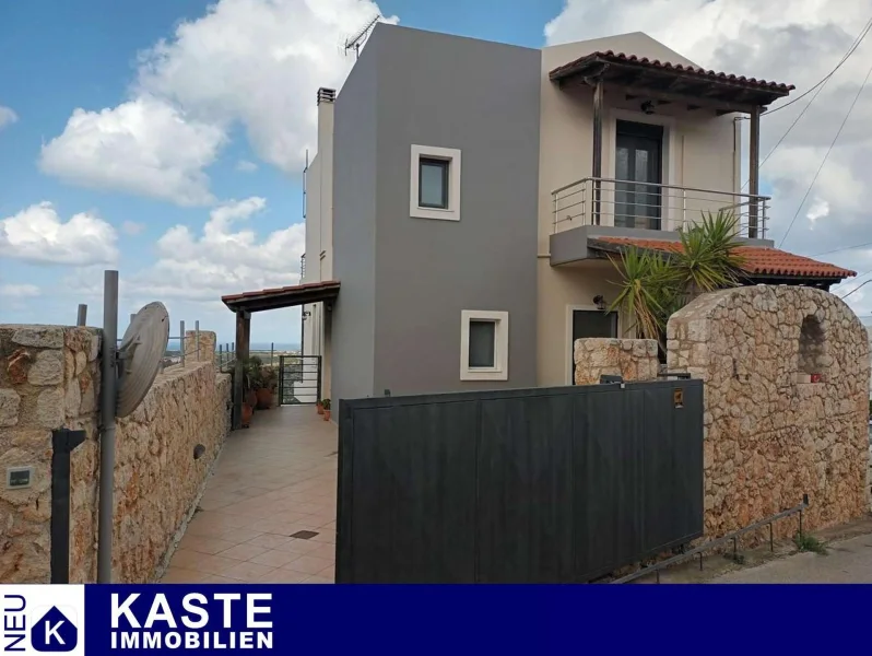 Titel - Haus kaufen in Akrotiri - Modernes Einfamilienhaus mit Blick auf das Meer und die Berge auf Kreta.