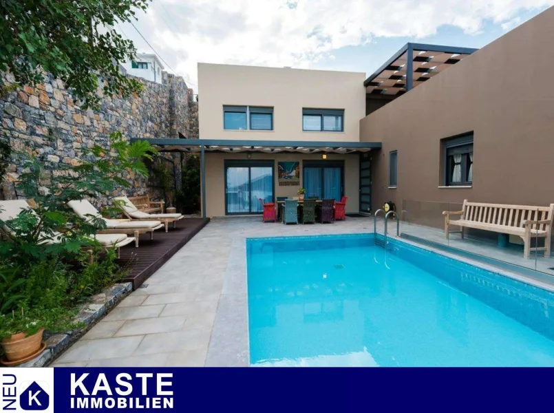 Titel - Haus kaufen in Elounda - Moderne Villa mit 5 Schlafzimmern, Pool und spektakulärem Blick auf die Bucht von Elounda