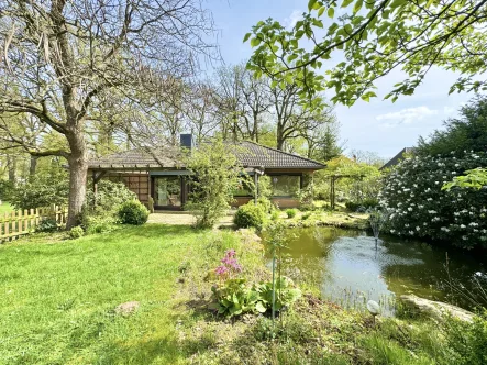 Rückseite, Garten - Haus kaufen in Bad Fallingbostel (Dorfmark) - Großzügiger & ansprechender Bungalow mit idyllischem Garten in reizvoller Lage