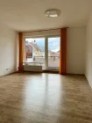 Wohnzimmer mit Balkon