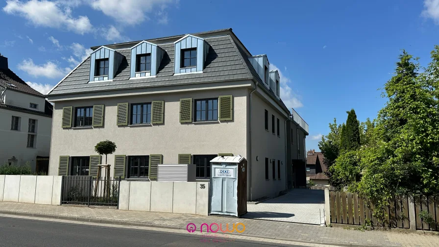Frontansicht - Wohnung kaufen in Wolfenbüttel - Wolfenbüttel: Große 3-4 Zimmer Neubau-Stadtwohnung, Balkon, Tiefgaragenstellplatz