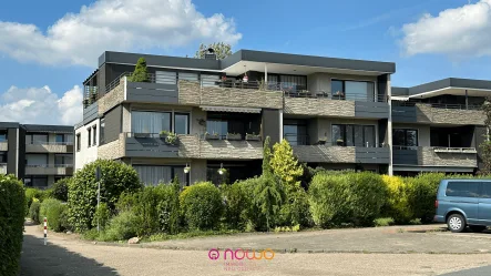 Südansicht mit Balkon - Wohnung kaufen in Braunschweig - Volkmarode: Nur als Kapitalanlage! - Vermietete 4-Zim. Erdgeschosswohnung. Parkplatz inklusive.