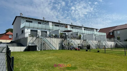 Ansicht von der Gartenseite her - Haus kaufen in Calberlah - Calberlah: Bezugsfertiges Reihenmittelhaus mit Garten und zwei Stellplätzen. Wärmepumpe.