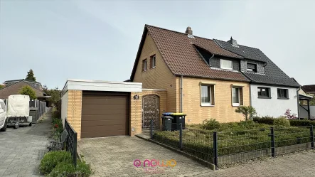 Hausansicht - Haus kaufen in Wolfenbüttel - Ruhig gelegene Doppelhaushälfte mit großem Garten