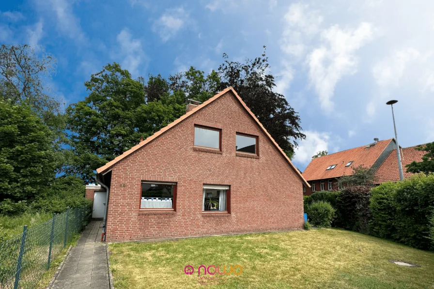 Vorderansicht - Haus kaufen in Cremlingen / Weddel - Endlich in den eigenen Garten! - Schönes Einfamilienhaus mit Südterrasse und Carport in Weddel