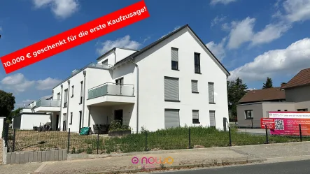 Außenansicht Südost Haus 1_Stand Juni 2024 - Wohnung kaufen in Sickte - Bezugsfertig! Und 10.000 € beim Kauf geschenkt! Sonnige Neubau 3-Zim.-Wohnung mit Balkon