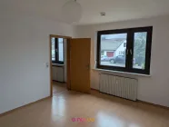 Raum 1 Musterwohnung im Haus