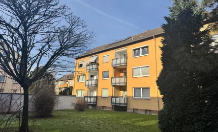 Gartenansicht (2) - Zinshaus/Renditeobjekt kaufen in Wolfenbüttel - 4-Zimmer-Erdgeschosswohnung mit Balkon und Garage in WF-Fümmelse!