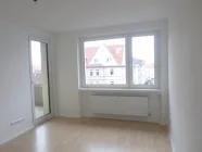 Wohnzuímmer mit Zugang Balkon