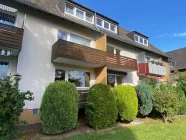 Blick zu der Erdgeschosswohnung mit Südbalkon