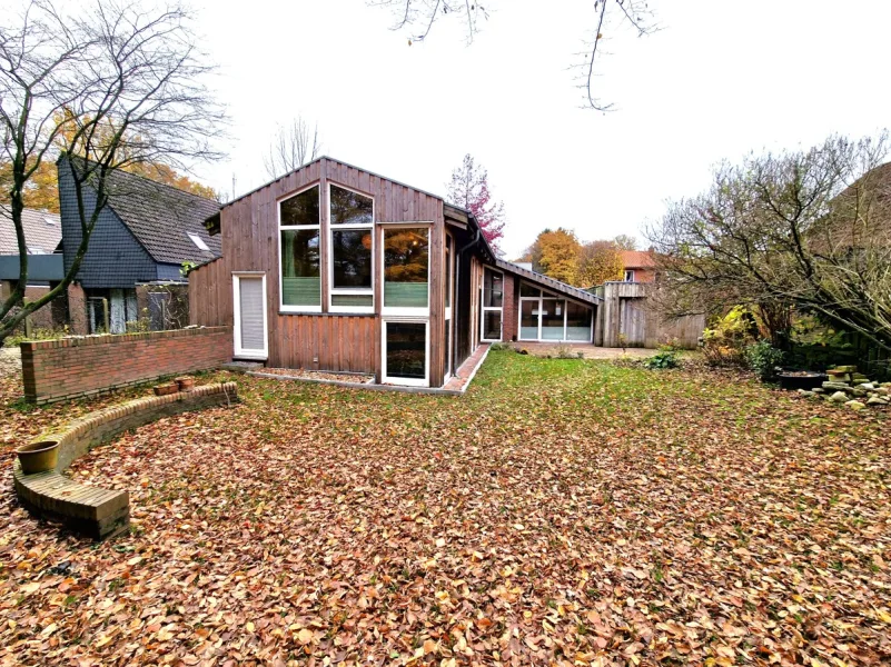 Seitenansicht - Haus kaufen in Oldenburg - Handwerker aufgepasst! Architektenhaus mit Wasserschaden!