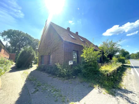 Straßenansicht - Haus kaufen in Wardenburg - Zwangsversteigerung ! Schnäppchen Chance !