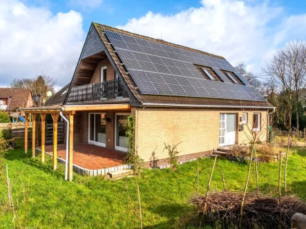 Seitenansicht - Haus kaufen in Oldenburg - Teilsaniertes Einfamilienhaus in gefragter, rückwärtiger und ruhiger Lage