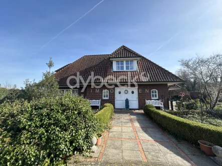 Frontansicht - Wohnung mieten in Embsen / Oerzen - Großzügige 3-Zimmer-Wohnung in traumhafter Lage mit eigenem Gartenanteil.