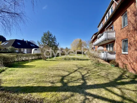 Straßenansicht - Wohnung kaufen in Wendisch Evern - Attraktive 3-Zimmer-Wohnung in grüner Wohnlage.