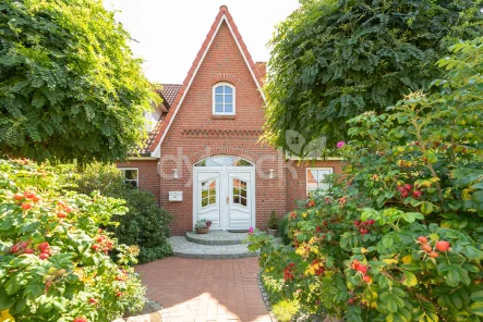 Ansicht - Haus kaufen in Lüneburg - Wohnen auf hohem Niveau - hochwertiges und gepflegtes  Friesenhaus in ruhiger Lage.