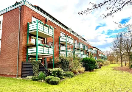 Ansicht hinten - Wohnung kaufen in Lüneburg - Charmante 2-Zimmer-Etagenwohnung im beliebten Lüneburger Stadtteil Bockelsberg.