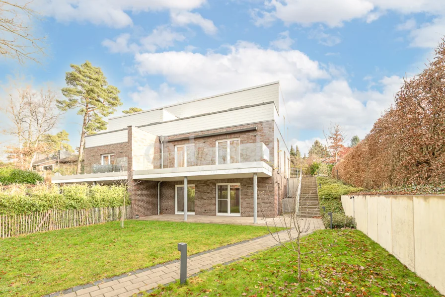 Hausansicht Garten - Haus kaufen in Deutsch Evern - Anspruchsvolle Neubau-Doppelhaushälfte in ausgesuchter Lage von Deutsch Evern.