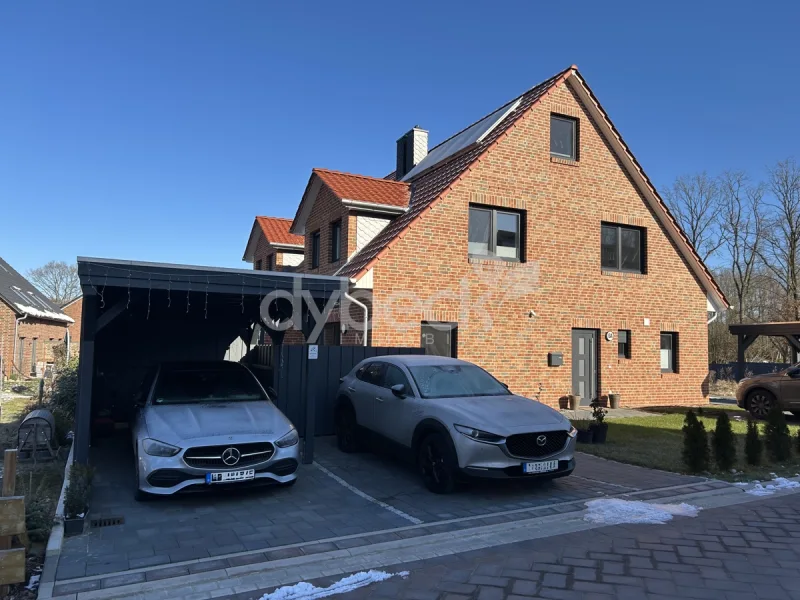 Außenansicht - Haus mieten in Amelinghausen - Familienfreundliche Neubau-Doppelhaushälfte in idyllischer Umgebung.