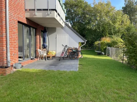 Titelbild - Wohnung mieten in Lüneburg - Neuwertig mit Sonnen-Terrasse und eigenem Garten
