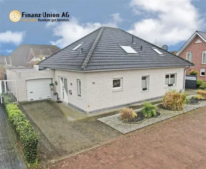 Außenansicht - Haus kaufen in Neuenhaus , Dinkel - Willkommen zu Hause: Moderner Bungalow in ruhiger Siedlung von Veldhausen!