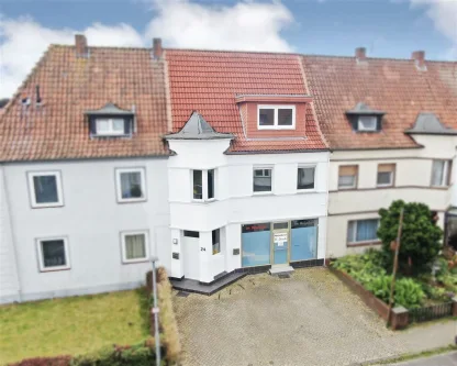 Außenansicht vorne - Haus kaufen in Nordhorn - Renditestarkes Wohn- und Geschäftshaus in Nordhorn - 199 m² Gesamtfläche