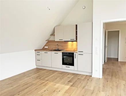 Wohnzimmer - Wohnung mieten in Emlichheim - Erstbezug: Moderne Zwei-Zimmer-Wohnung mit Balkon in Emlichheim zu vermieten! 