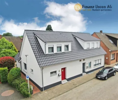 Außenaufnahme - Haus kaufen in Nordhorn - Im Zentrum von Nordhorn: Kernsanierte Doppelhaushälfte mit Top-Energieeffizienz!