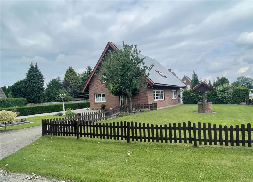 Straßenseite - Haus kaufen in Neuenhaus , Dinkel - Freistehendes Einfamilienhaus mit großer Garage und Vollkeller!