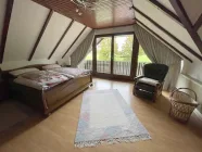 Schlafzimmer mit Loggia im DG