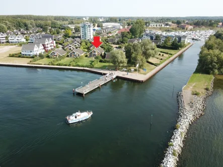 Luftbild  - Haus kaufen in Rechlin - TOP Ferienimmobilie in 1A Wasserlage! Jetzt Traum vom Haus am See erfüllen!