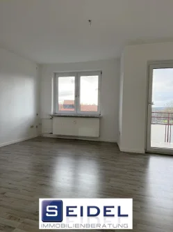 Wohnzimmer - Wohnung mieten in Wolfenbüttel - Prima geschnittene 1-Zimmer-Whg. mit herrlicher Aussicht mitten in WF