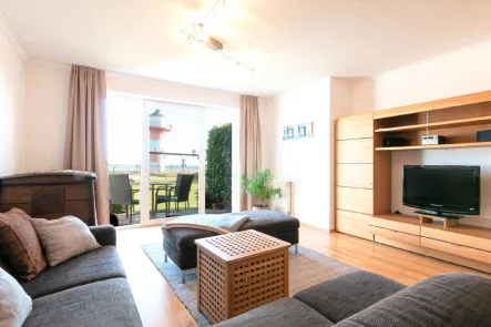Wohnzimmer - Wohnung mieten in Grünendeich - Grünendeich: modernes 2-Zimmer Apartment mit direktem Blick auf die Elbe
