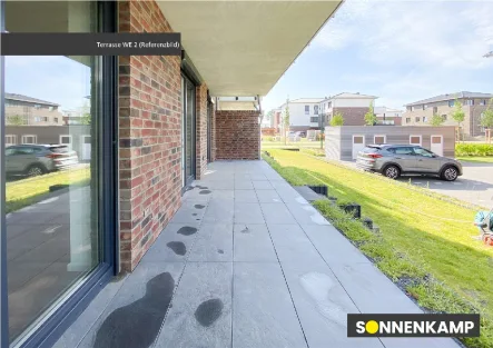 Referenzbild der Terrasse - Wohnung kaufen in Fredenbeck - Nachhaltig  und  modern! Großzügige 2-Zimmer-Wohnung mit riesiger überdachter Terrasse