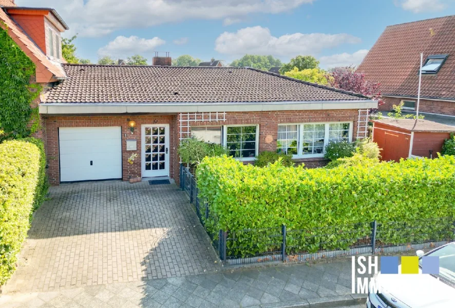 Außenansicht - Haus kaufen in Stade - Charmanter und gemütlicher Bungalow in Stade-Hohenwedel