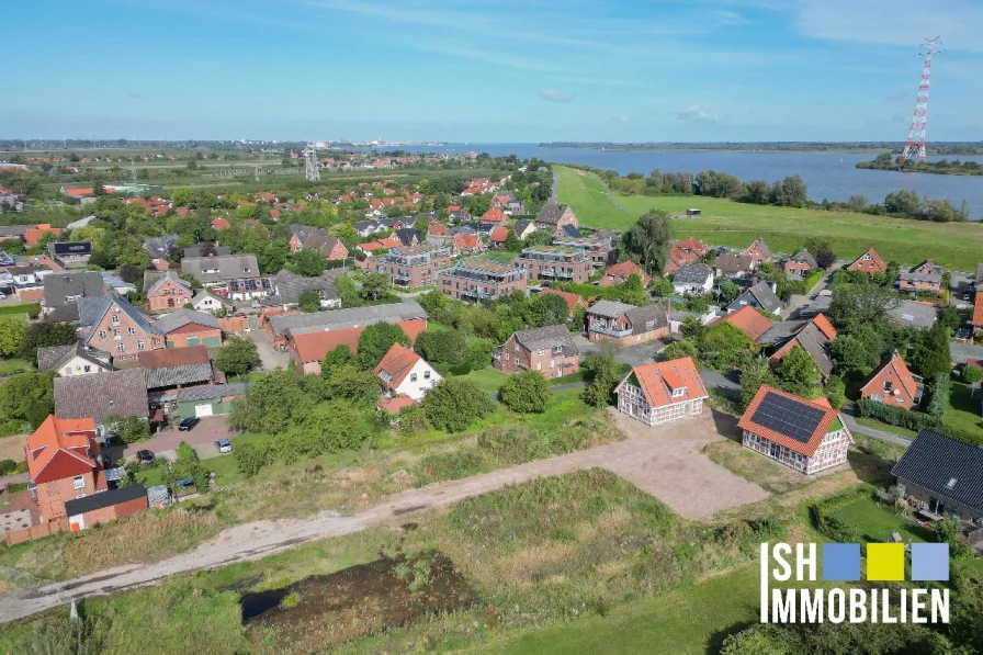 Blick in die Ferne - Zinshaus/Renditeobjekt kaufen in Hollern-Twielenfleth - Attraktive Kapitalanlage im Alten Land