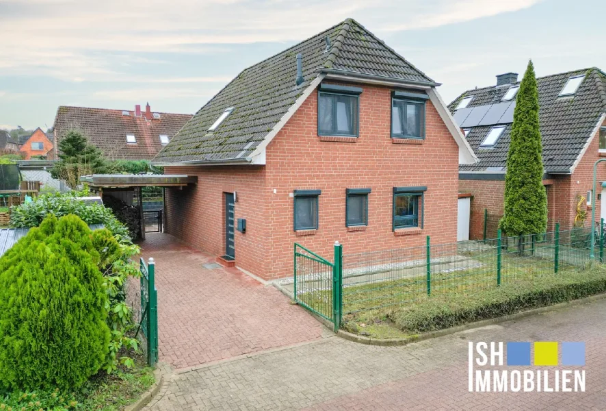 Außenansicht - Haus kaufen in Neu Wulmstorf - Hochwertig modernisiertes Einfamilienhaus in bester Lage 