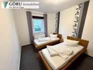 Schlafzimmer 1 Wohnung 1