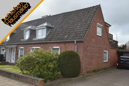  - Haus kaufen in Heide - Verkauf einer modernisierten Doppelhaushälfte mit Garage in Heide, Kreis Dithmarschen