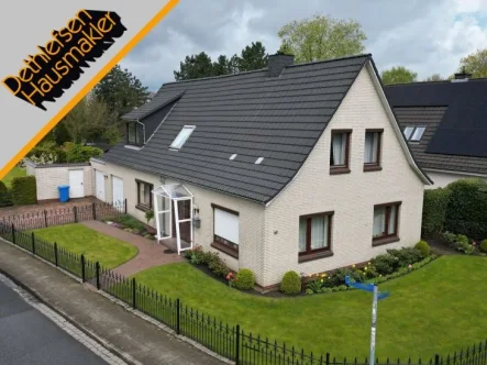  - Haus kaufen in Heide - Ein-/Zweifamilienhaus mit Doppelgarage und optionalem ca. 600 m²-Bauplatz in ruhiger Lage von Heide