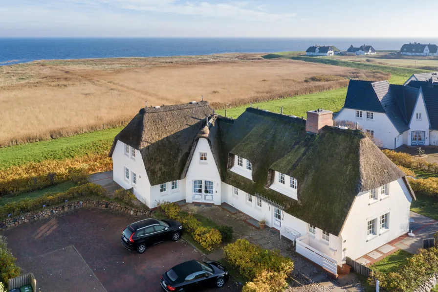  - Wohnung kaufen in Rantum - Schöne Dachgeschosswohnung unter Reet mit Blick über das Wattenmeer von Rantum