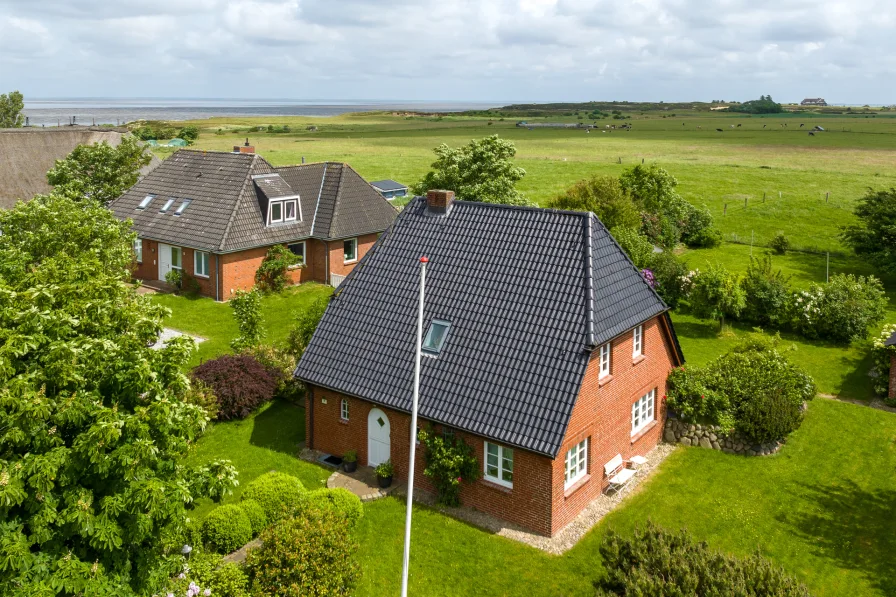  - Haus kaufen in Sylt-Ost / Morsum - Einfamilienhaus mit tollem Blick auf das Morsumer Kliff - ideal auch als Baugrundstück