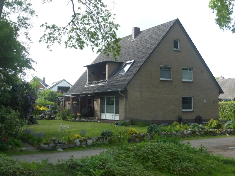 Solides ZFH in grüner Lage! - Haus kaufen in Wiefelstede - Zweifamilienhaus in sehr schöner Zentrumslage