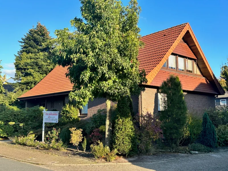 Eine hochwertige Immobilie! - Haus kaufen in Wiefelstede - Platz für Familie, Hobby und Beruf: geräumiges Wohnhaus in gepflegter Lage!